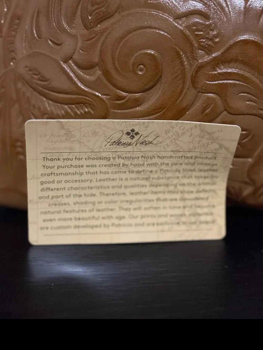 Authentic brand new Patricia Nash clutch in the color biscuit- never used-perect